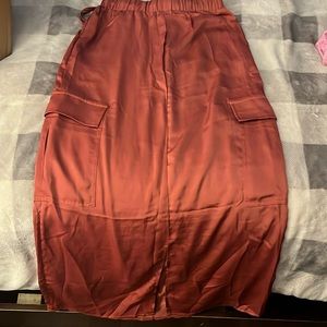 I’m selling this brand new pinkish colored skirt never wore it before